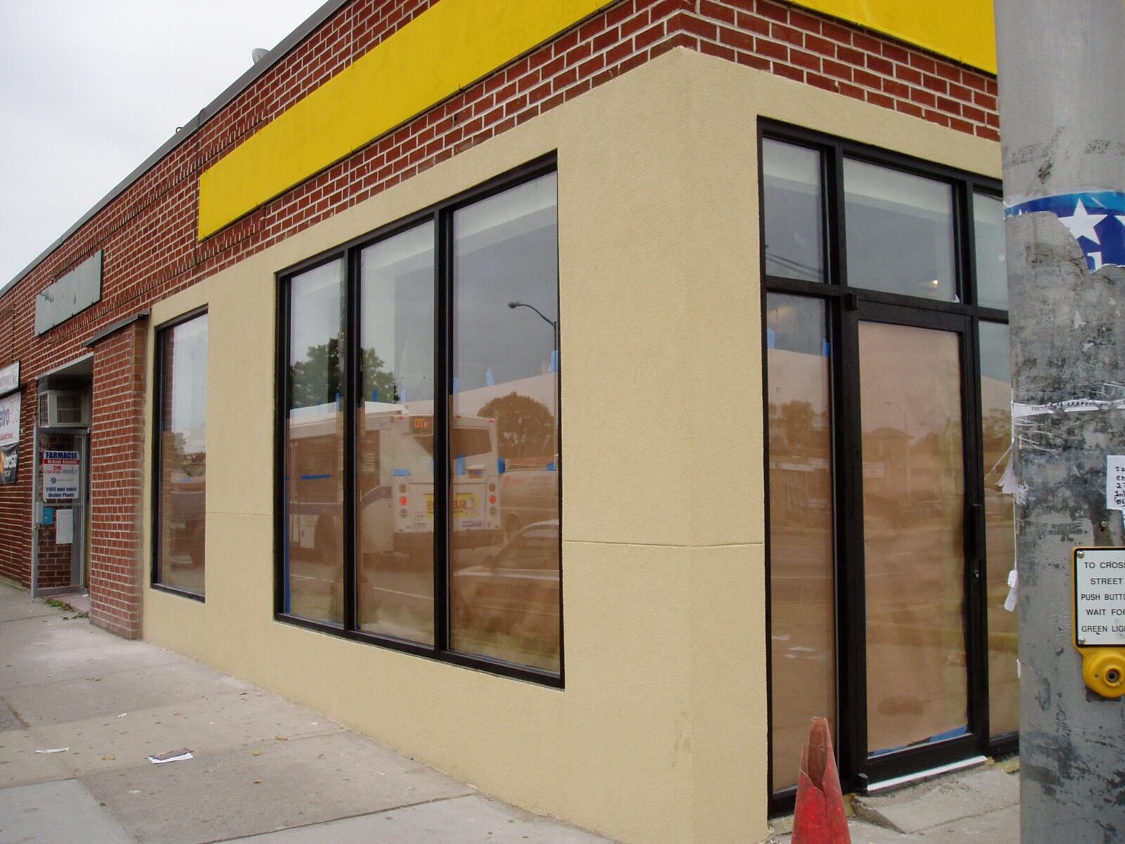 Commercial storefront corner renovation Queens NY