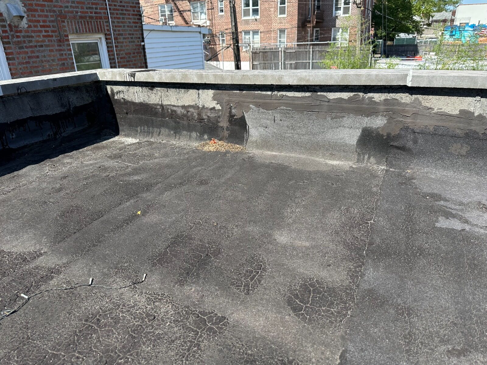 Cracked alligatored roof before repair - Queens NY