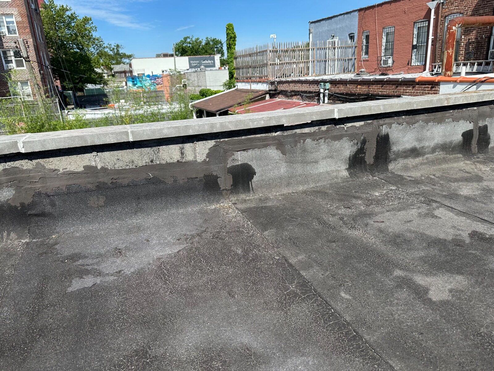 Deteriorated roof edge before repair - Queens NY