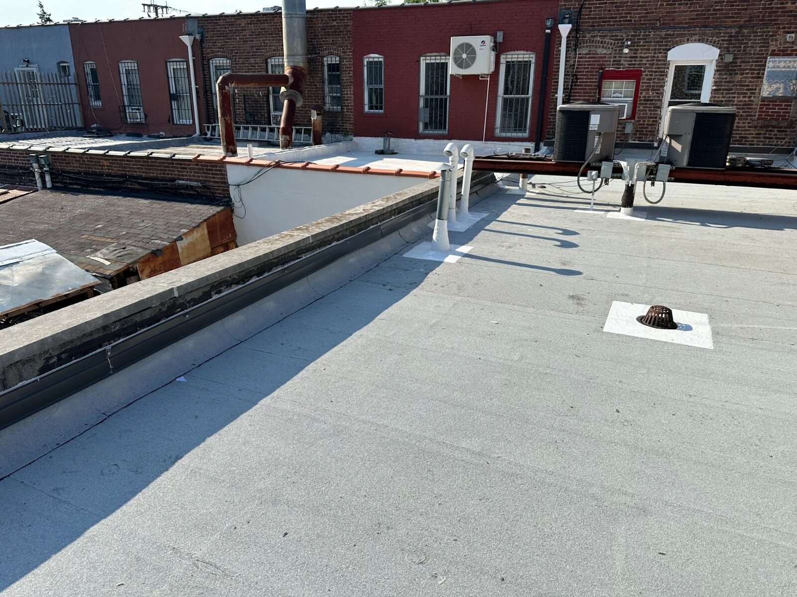 Completed roof with drains and roof vents - Nassau County