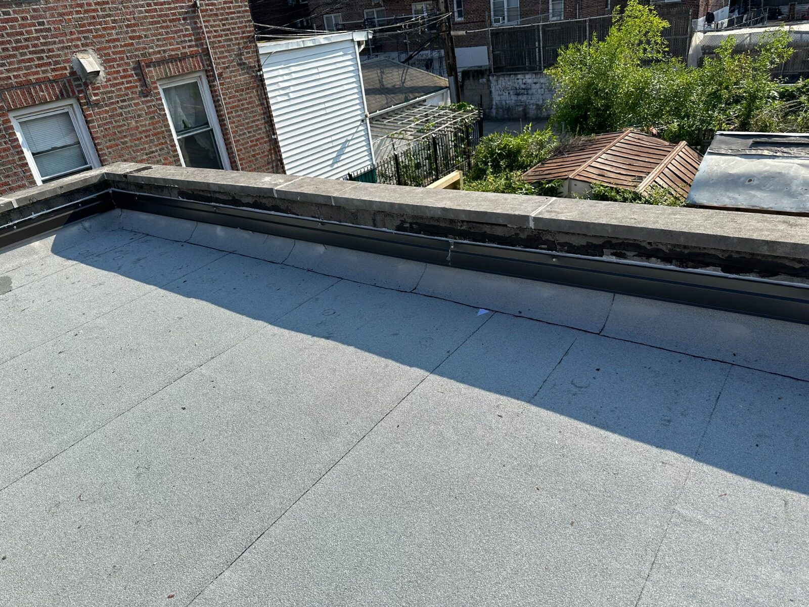 Finished roof edge and coping detail - Nassau County